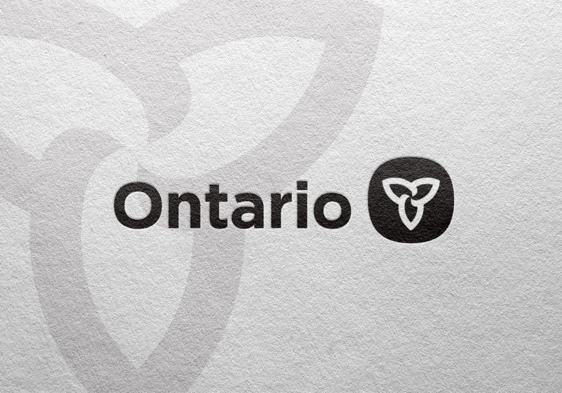 The word “Ontario” in black text with a stylized trillium flower logo beside it, set against a light textured background.